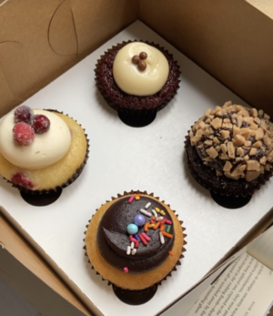 four cupcakes in a box from cupcakin’